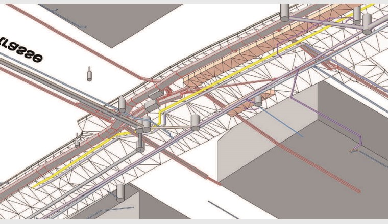 Fig. 3 Modell mit bestehenden und projektierten Werkleitungen. Die Blickrichtung erfolgt von unter der Strasse (Bildschirmausschnitt Revit).