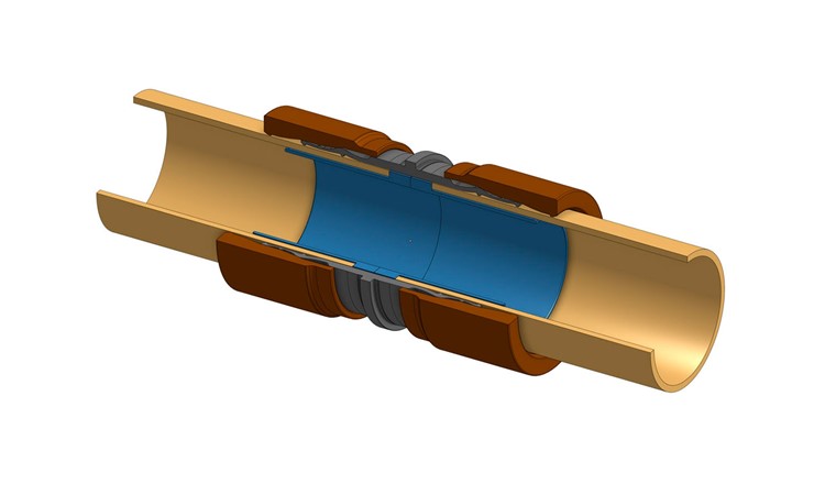 Fig. 2 Système d’assemblage par sertissage avec douille de support pour conduites de chaleur à distance enterrées: coupe transversale du raccord (en marron foncé et gris), de la douille de support (en bleu) et des extrémités de tube (en beige). (© FIPE AG)